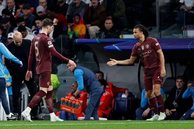 John Stones of Manchester City leaves the pitch with an injury early in the game Real Madrid v Manchester City, UEFA Champions League, Knockout Round Play-offs, Second Leg, Football, Santiago BernaboÆ?Ã?Æ?o Ã? u, Madrid, Spain - 19 Feb 2025 EDITORIAL USE ONLY No use with unauthorised audio, video, data, fixture lists, club league logos or live services. Online in-match use limited to 120 images, no video emulation. No use in betting, games or single club league player publications.  Copyright: xRubenxAlbarran Shutterstockx 15137179l