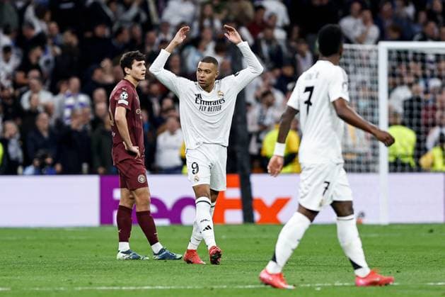 Kylian MbappÃ of Real Madrid celebrates scoring a goal for their side to make it 2-0 Real Madrid v Manchester City, UEFA Champions League, Knockout Round Play-offs, Second Leg, Football, Santiago BernaboÆ?Ã?Æ?o Ã? u, Madrid, Spain - 19 Feb 2025 EDITORIAL USE ONLY No use with unauthorised audio, video, data, fixture lists, club league logos or live services. Online in-match use limited to 120 images, no video emulation. No use in betting, games or single club league player publications.  Copyright: xRubenxAlbarran Shutterstockx 15137179ah