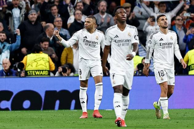 Kylian MbappÃ of Real Madrid celebrates scoring a goal for their side to make it 2-0 Real Madrid v Manchester City, UEFA Champions League, Knockout Round Play-offs, Second Leg, Football, Santiago BernaboÆ?Ã?Æ?o Ã? u, Madrid, Spain - 19 Feb 2025 EDITORIAL USE ONLY No use with unauthorised audio, video, data, fixture lists, club league logos or live services. Online in-match use limited to 120 images, no video emulation. No use in betting, games or single club league player publications.  Copyright: xRubenxAlbarran Shutterstockx 15137179ai