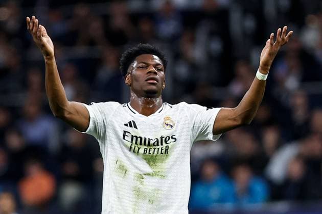 AurÃ lien TchouamÃ ni of Real Madrid appeals Real Madrid v Manchester City, UEFA Champions League, Knockout Round Play-offs, Second Leg, Football, Santiago BernaboÆ?Ã?Æ?o Ã? u, Madrid, Spain - 19 Feb 2025 EDITORIAL USE ONLY No use with unauthorised audio, video, data, fixture lists, club league logos or live services. Online in-match use limited to 120 images, no video emulation. No use in betting, games or single club league player publications.  Copyright: xRubenxAlbarran Shutterstockx 15137179aj