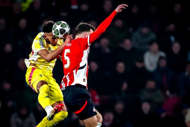 Juventus defender Lloyd Kelly, PSV Eindhoven forwarder Ivan Perisic during the match PSV - Juventus at the Philips stadium for the UEFA Champions League - Knockout phase play-offs - 2nd leg season 2024-2025 in EINDHOVEN, Netherlands on 19 february 2025, (photo by Marcel van Dorst EYE4images DeFodi Images)