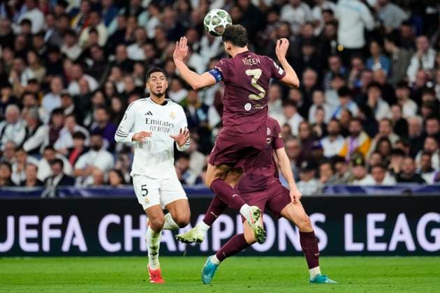 Real Madrid vs Manchester City Ruben Dias of Manchester City and Jude Bellingham of Real Madrid CF during Real Madrid vs Manchester City at Santiago Bernabeu Stadium on February 19th 2025  Copyright: xSenis-Cebolla ALFAQUIx