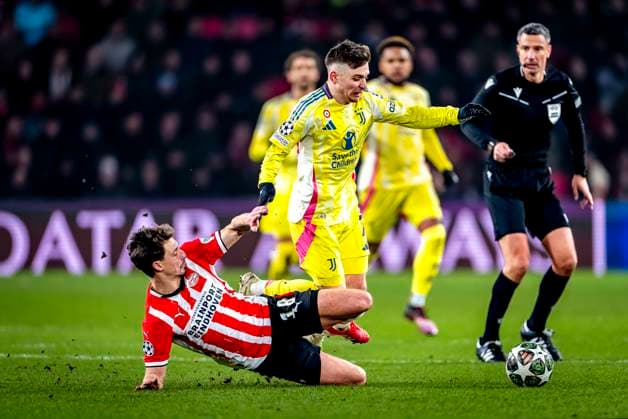 PSV Eindhoven defender Olivier Boscagli, Juventus forwarder Franscisco Conceicao during the match PSV - Juventus at the Philips stadium for the UEFA Champions League - Knockout phase play-offs - 2nd leg season 2024-2025 in EINDHOVEN, Netherlands on 19 february 2025, (photo by Marcel van Dorst EYE4images DeFodi Images)