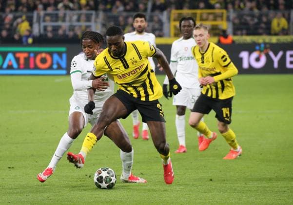 19.02.2025, xgrfx, Fussball UEFA Champions League, Borussia Dortmund - Sporting Lissabon v.l. Alexandre Brito (Sporting), Serhou Guirassy (Borussia Dortmund) (DFL DFB REGULATIONS PROHIBIT ANY USE OF PHOTOGRAPHS as IMAGE SEQUENCES and or QUASI-VIDEO) Dortmund