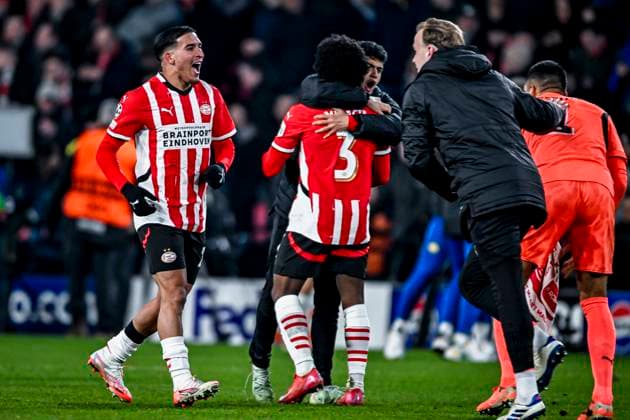 PSV forwarder Couhaib Driouech, PSV defender Tyrell Malacia celebrating the win 3-1, during the match PSV - Juventus at the Philips stadium for the UEFA Champions League - Knockout phase play-offs - 2nd leg season 2024-2025 in EINDHOVEN, Netherlands on 19 february 2025, (photo by Stefan Koops EYE4images DeFodi Images)