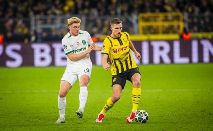 Dortmund, Germany. 19th Feb 2025. Nico Schlotterbeck (BvB) Conrad Harder (SP) Borussia Dortmund - Sporting Lisbon Borussia Dortmund - Sporting Lissabon 19.02.2025