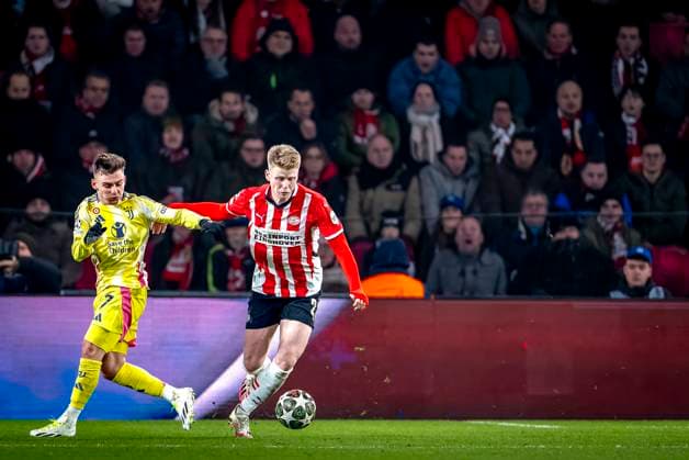 Juventus forwarder Franscisco Conceicao, PSV Eindhoven midfielder Jerdy Schouten during the match PSV - Juventus at the Philips stadium for the UEFA Champions League - Knockout phase play-offs - 2nd leg season 2024-2025 in EINDHOVEN, Netherlands on 19 february 2025, (photo by Marcel van Dorst EYE4images DeFodi Images)