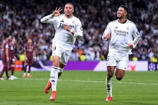 MBAPPE Kylian Team Real Madrid jubelt nach seinem dritten Tor mit BELLINGHAM Jude UEFA Champions League Saison 2024 - 2025 Spiel Real Madrid - Manchester City 3 : 1 am 19.02.2025 in Madrid DFL REGULATIONS PROHIBIT ANY USE OF PHOTOGRAPHS as IMAGE SEQUENCES and or QUASI-VIDEO Copyright: xLacixPerenyix