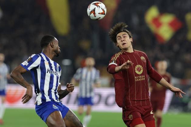 Romaâ??s Argentinian forward Paulo Dybala challenges for the ball with Porto s Brazilian defender Otavio during UEFA Europa League Knockout Phase Playoff - Second Leg between AS Roma vs Porto at Olimpico stadium on February 20, 2025 in Rome, Italy.  Copyright: xAntonioxBalasco IPAxSportx xipa-agency.netx xx IPA_54332988 IPA_Agency_IPA54332988
