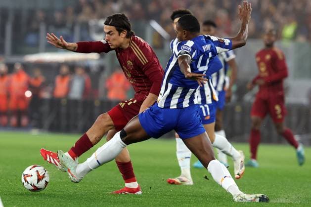 Football: UEFA EUROPE LEAGUE 2024 2025 - play off - AS ROMA vs FC PORTO on February 20, 2025 at Olympic Stadium in Rome Rome, Italy 20.02.2025 : Paulo Dybala of Roma, Otavio of Porto seen in action during Uefa Europe League 2024-2025 football match, play-off, AS Roma vs FC Porto at Olympic stadium in Rome. Rome Olympic stadium italy italy Copyright: xmarcoxiacobucci