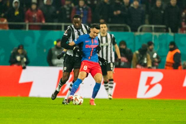 Thu 20 February, UEFA Europa League, League Knockout phase play-offs 2nd leg, National Arena, Bucharest, FCSB vs PAOK 8 Adrian Sut puts in a tackle