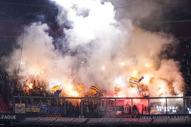 2025-02-20 AFC Ajax v R. Union Saint-Gilloise - UEFA Europa League 2024 25 League Knockout Play-off Second Leg AMSTERDAM, NETHERLANDS - FEBRUARY 20: fans of R. Union Saint-Gilloise with fireworks and flags during the UEFA Europa League 2024 25 League Knockout Play-off Second Leg match between AFC Ajax and R. Union Saint-Gilloise at Johan Cruijff Arena on February 20, 2025 in Amsterdam, Netherlands. Amsterdam Johan Cruijff Arena Netherlands Content not available for redistribution in The Netherlands directly or indirectly through any third parties. Copyright: xJorisxVerwijstx
