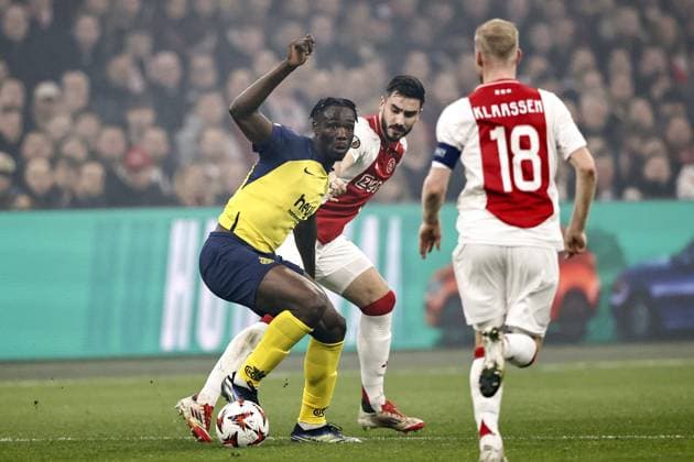 AMSTERDAM - (l-r) Promise David of Royale Union Saint-Gilloise, Josip Sutalo of Ajax, Davy Klaassen of Ajax during the Europa League playoff match between Ajax Amsterdam and Union SG at the Johan Cruijff ArenA on Feb. 20, 2025 in Amsterdam, Netherlands. ANP MAURICE VAN STEEN UEFA Europa League 2024 25 League Knockout Play-off Second Leg 2024 25 xVIxANPxSportx xxANPxIVx 520466160 originalFilename: 520466160.jpg