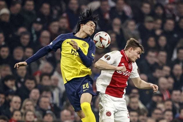 AMSTERDAM - (l-r) Koki Machida of Royale Union Saint-Gilloise, Christian Rasmussen of Ajax during the Europa League playoff match between Ajax Amsterdam and Union SG at the Johan Cruijff ArenA on Feb. 20, 2025 in Amsterdam, Netherlands. ANP MAURICE VAN STEEN UEFA Europa League 2024 25 League Knockout Play-off Second Leg 2024 25 xVIxANPxSportx xxANPxIVx 520468343 originalFilename: 520468343.jpg