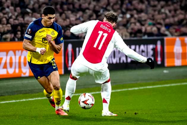 Union Saint-Gilloise forwarder Anan Khalaili, AFC Ajax Amsterdam forwarder Mika Godts during the match Ajax - Union SG at the Johan Cruijff ArenA for the UEFA Europa League - Knockout phase play-offs - 2nd leg season 2024-2025 in AMSTERDAM, Netherlands on 20 february 2025, (photo by Marcel van Dorst EYE4images DeFodi Images)