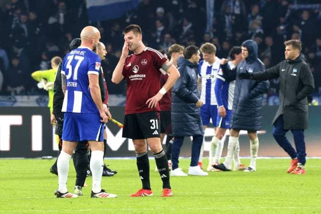 DEU, DFL, 2. FBL, Hertha BSC vs. 1.FC Nuernberg, 21.02.2025, Berliner Olympiastadion, Berlin, DEU, DFL, 2. FBL, Hertha BSC vs. 1.FC Nuernberg, im Bild Toni Leistner (Hertha BSC Berlin 37), Knoche, Robin (1.FC Nuernberg 31) DFL - regulations prohibit any use of Photographs as image sequences and or quasi-video Foto: Juergen Engler nordphoto GmbH