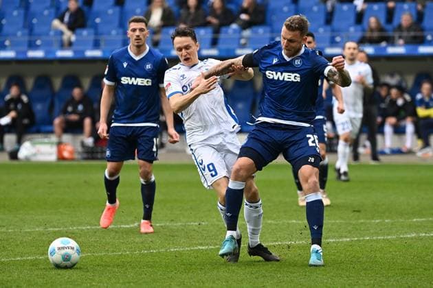 22.02.2025, xjhx, Fussball 2.Bundesliga, Karlsruher SC - 1.FC Magdeburg v.l. Martin Kaars (1.FC Magdeburg) Marcel Franke (Karlsruher SC KSC) Zweikampf, Aktion, action, battle for the ball (DFL DFB REGULATIONS PROHIBIT ANY USE OF PHOTOGRAPHS as IMAGE SEQUENCES and or QUASI-VIDEO) Karlsruhe