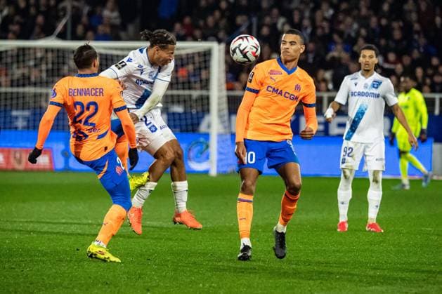 FOOTBALL :AJ Auxerre vs Olympique de Marseille - Ligue 1 - JournÃ e 23 - 21 02 2025 Mason Greenwood (OM) Kevin Danois (AJ Auxerre) AuxerreFrance  Copyright: xBaptistexAutissierx