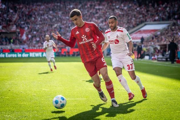 2. Fußball Bundesliga: 1. FC Köln - Fortuna Düsseldorf, 23.02.2025 Giovanni Haag (Fortuna Düsseldorf, 6) und Linton Maina (1. FC Köln, 37) im Zweikampf; Köln, 23.02.2025 - 1. FC Köln - Fortuna Düsseldorf 23. Spieltag der 2. Fussball-Bundesliga: , 1. FC Köln - Fortuna Düsseldorf in der Rhein-Energie-Stadion in Köln. DFL REGULATIONS PROHIBIT ANY USE OF PHOTOGRAPHS AS IMAGE SEQUENCES AND OR QUASI-VIDEO.