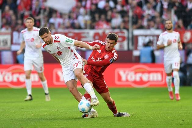 Imad Rondic (1. FC Koeln) und Giovanni Haag (Fortuna Duesseldorf) im Zweikampf waehrend des Spiels der 2. Bundesliga zwischen dem 1. FC Köln und Fortuna Düsseldorf im RheinEnergieStadion am 23. February 2025 in Köln, Deutschland. (Foto von Ralf Treese DeFodi Images) +++ Imad Rondic (1. FC Koeln) und Giovanni Haag (Fortuna Duesseldorf) battle for the ball during the 2. Bundesliga match between 1. FC Köln and Fortuna Düsseldorf at RheinEnergieStadion on February 23, 2025 in Cologne, Germany. (Photo by Ralf Treese DeFodi Images) DFB DFL REGULATIONS PROHIBIT ANY USE OF PHOTOGRAPHS AS IMAGE SEQUENCES AND OR QUASI-VIDEO. (Photo by Ralf Treese DeFodi Images)