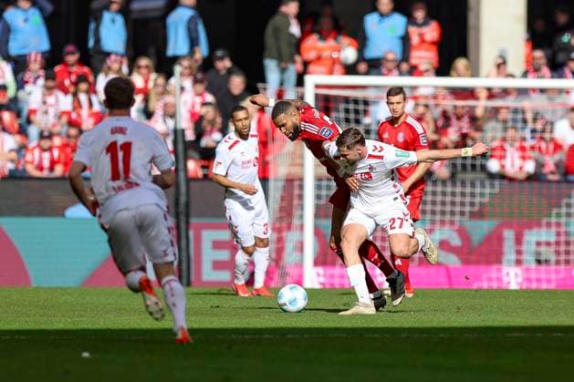 Köln, Deutschland, 23.02.25: Jamil Siebert (Fortuna Düsseldorf) und Imad Rondic (1. FC Köln) im Kampf um den Ball waehrend des Spiels der 2. Bundesliga zwischen 1. FC Köln vs Fortuna Düsseldorf im RheinEnergieStadion Köln RheinEnergieStadion North Rhine-Westphalia Germany