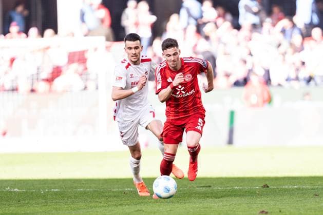GER, 2. FBL, 1. FC Köln Koeln vs Fortuna Düsseldorf Duesseldorf 23.02.2025, Rheinenergie Stadion, Köln, GER, 2. FBL, 1. FC Köln Koeln vs Fortuna Düsseldorf Duesseldorf Im Bild: Zweikampf zwischen Moritz Heyer (Fortuna Düsseldorf Fortuna Duesseldorf, 5) und Dejan LjubiÄiÄ‡ Ljubicic (1. FC Köln Koeln, 7)