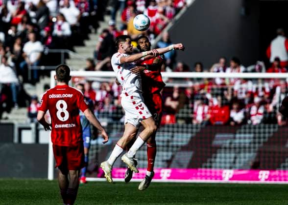 Köln, RheinEnergieStadion, 23.02.2025: Imad Rondic of Koeln jumps for a header against Siebert Jamil of Duesseldorf during the 2.Bundesliga match 1.FC Koeln vs. Fortuna Duesseldorf.