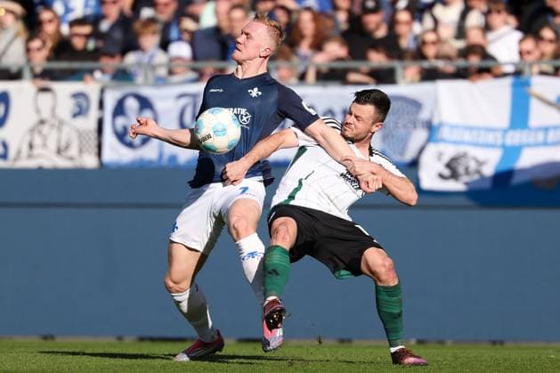 2025.02.23 xJFAx 2.Bundesliga 2024 25 23.Spieltag SV Darmstadt 98 - FC Schalke 04 v.l., Isac Alexi Sivert Lidberg (SV Darmstadt 98), Adrian Gantenbein (FC Schalke 04), Zweikampf, Action, Aktion, Battles for the Ball (DFL DFB REGULATIONS PROHIBIT ANY USE OF PHOTOGRAPHS as IMAGE SEQUENCES and or QUASI-VIDEO)
