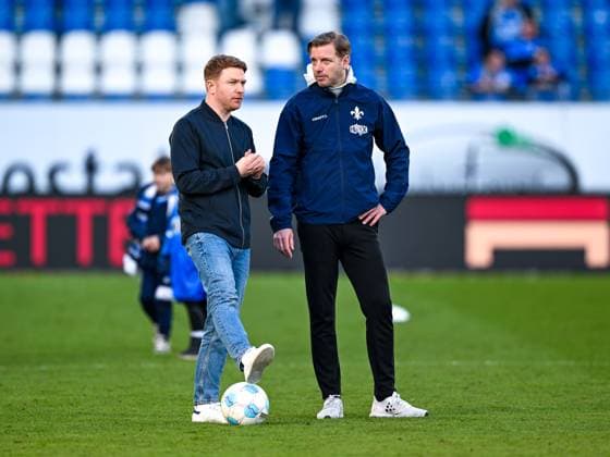 Florian Kohfeldt (SV Darmstadt 98, Trainer) und Paul Fernie (SV Darmstadt 98, Sportdirektor), GER, SV Darmstadt 98 vs. FC Schalke 04, Fussball, 23. Spieltag, Saison 2024 2025, 23.02.2025. DFL REGULATIONS PROHIBIT ANY USE OF PHOTOGRAPHS as IMAGE SEQUENCES and or QUASI-VIDEO. GER, SV Darmstadt 98 vs. FC Schalke 04, Fussball, 23. Spieltag, Saison 2024 2025, 23.02.2025. Darmstadt