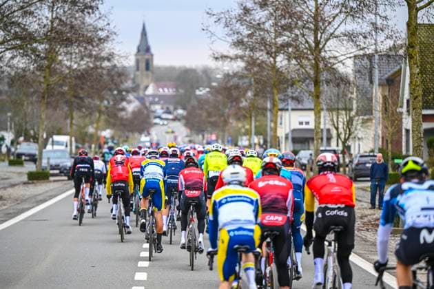 Omloop Het Nieuwsblad 2025 Cycling Race Ninove, Belgium - March 01 : Illustration picture of the peloton during the Men Elite UCI World Tour 80th Flanders Classics Omloop Het Nieuwsblad cycling race of 197 kms with start in Ghent and finish in Ninove on March 1, 2025 in Ninove, Belgium, 1 03 2025 ( Motordriver Kenny Verfaillie - Ninove Belgium  Copyright: xVincentxKalutx