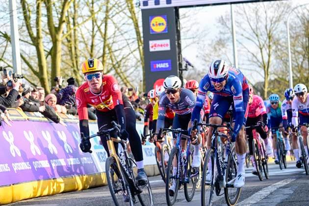 Omloop Het Nieuwsblad 2025 Cycling Race Ninove, Belgium - March 1 : Waerenskjold Søren (NOR) of Uno-X Mobility, Philipsen Jasper (BEL) of Alpecin-Deceuninck during the Men Elite UCI World Tour 80th Flanders Classics Omloop Het Nieuwsblad cycling race of 197 kms with start in Ghent and finish in Ninove on March 01, 2025 in Ninove, Belgium, 01 03 2025 ( Motordriver Kenny Verfaillie - Ninove Belgium  Copyright: xPeterxDexVoechtx