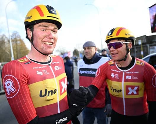 Norwegian Soren Waerenskjold of Uno-X Mobility (L) celebrates after winning the men s one-day cycling race Omloop Het Nieuwsblad (UCI World Tour), 197 km from Gent to Ninove, Saturday 01 March 2025. JASPERxJACOBS  x113850035x