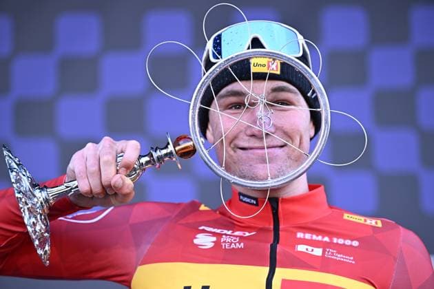 Norwegian Soren Waerenskjold of Uno-X Mobility celebrates on the podium after winning the men s one-day cycling race Omloop Het Nieuwsblad (UCI World Tour), 197 km from Gent to Ninove, Saturday 01 March 2025. JASPERxJACOBS  x113853481x