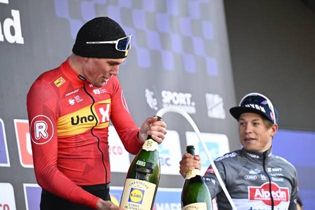 Norwegian Soren Waerenskjold of Uno-X Mobility and Belgian Jasper Philipsen of Alpecin-Deceuninck celebrate on the podium of the men s one-day cycling race Omloop Het Nieuwsblad (UCI World Tour), 197 km from Gent to Ninove, Saturday 01 March 2025. JASPERxJACOBS  x113853795x
