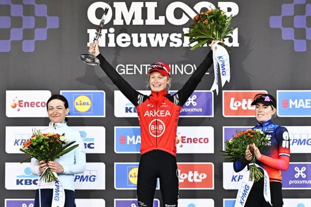 Polish Aurela Nerlo of Winspace Orange Seal, Belgian Lotte Claes of Arkea - B&B Hotels Women and Dutch Demi Vollering of FDJ-Suez celebrate on the podium of the women s one-day cycling race Omloop Het Nieuwsblad (UCI World Tour), 137,9km from Gent to Ninove, Saturday 01 March 2025. DIRKxWAEM  x113861199x