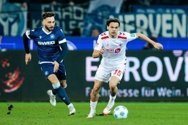 2. Fussball Bundesliga, Karlsruher SC - 1. FC Köln; 01.03.2025 Zweikampf Fabian Schleusener (Karlsruher SC, 24), Max Finkgräfe (1. FC Köln, 35) 2. Fussball Bundesliga, Karlsruher SC - 1. FC Köln, Karlsruhe, BBBank Wildpark am 01.03.2025 DFL REGULATIONS PROHIBIT ANY USE OF PHOTOGRAPHS AS IMAGE SEQUENCES AND OR QUASI-VIDEO.