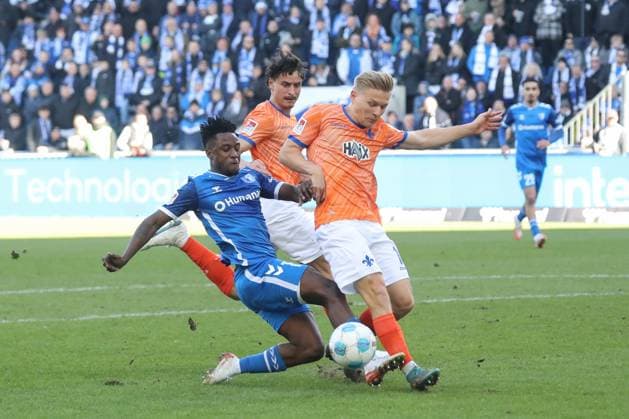 02.03.2025, xgox, Fussball 2. Bundesliga, 1. FC Magdeburg - SV Darmstadt 98 emspor, v.l. Lubambo Musonda (Magdeburg), Andreas Mueller (Müller, Darmstadt, 16) Zweikampf, Duell, Kampf, tackle (DFL DFB REGULATIONS PROHIBIT ANY USE OF PHOTOGRAPHS as IMAGE SEQUENCES and or QUASI-VIDEO) Magdeburg