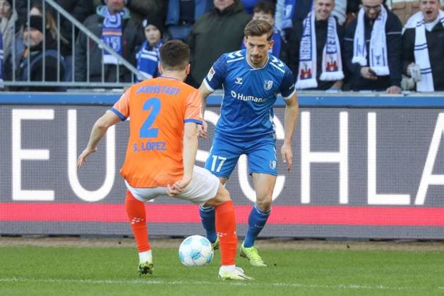 02.03.2025, xgox, Fussball - 2.Bundesliga, 1.FC Magdeburg - SV Darmstadt 98 emspor, v.l. Sergio Lopez (Darmstadt, 2), Alexander Nollenberger (Magdeburg, 17 ) Zweikampf, Duell, Kampf, tackle (DFL DFB REGULATIONS PROHIBIT ANY USE OF PHOTOGRAPHS as IMAGE SEQUENCES and or QUASI-VIDEO) Magdeburg