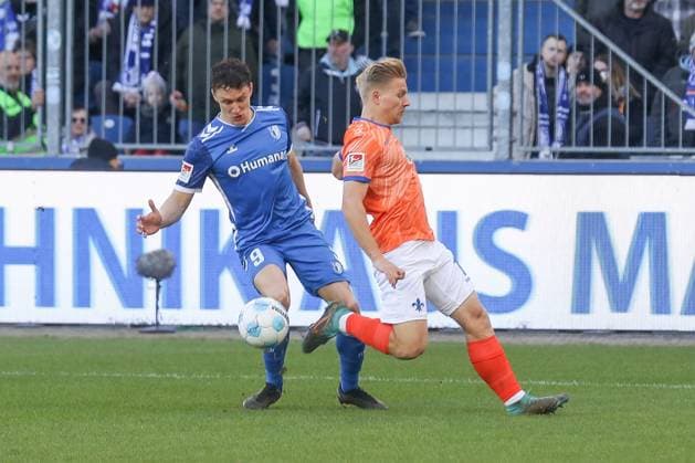02.03.2025, xgox, Fussball - 2.Bundesliga, 1.FC Magdeburg - SV Darmstadt 98 emspor, v.l. Andreas Mueller (Müller, Darmstadt, 16), Martijn Kaars (Magdeburg, 9) Zweikampf, Duell, Kampf, tackle (DFL DFB REGULATIONS PROHIBIT ANY USE OF PHOTOGRAPHS as IMAGE SEQUENCES and or QUASI-VIDEO) Magdeburg