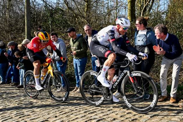 Norwegian Jonas Abrahamsen of Uno-X Mobility and Belgian Tim Wellens of UAE Team Emirates pictured in action during the Kuurne-Brussels-Kuurne one day cycling race, 196,9 km from Kuurne to Kuurne via Brussels, Sunday 02 March 2025. DIRKxWAEM  x114008568x