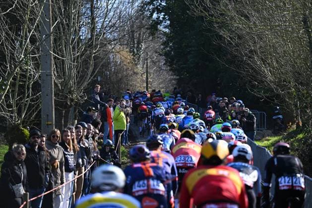 Kuurne - Brussel - Kuurne 2025 cycling race KUURNE, BELGIUM - MARCH 02 : Illustration picture of the peloton during the Men Elite UCI 1.Pro 77th Kuurne - Brussel - Kuurne cycling race of 203 kms with start in Kortrijk and finish in Kuurne on March 02, 2025 in Kuurne, Belgium, 02 03 2025 ( Motordriver Kenny Verfaillie & Kuurne Belgium  Copyright: xTomasxSiskx