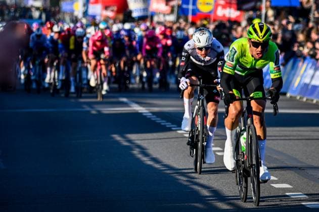 Belgian Tim Wellens of UAE Team Emirates and Belgian Criel Desal of Wagner Bazin WB pictured in action during the Kuurne-Brussels-Kuurne one day cycling race, 196,9 km from Kuurne to Kuurne via Brussels, Sunday 02 March 2025. ERICxLALMAND  x114020594x