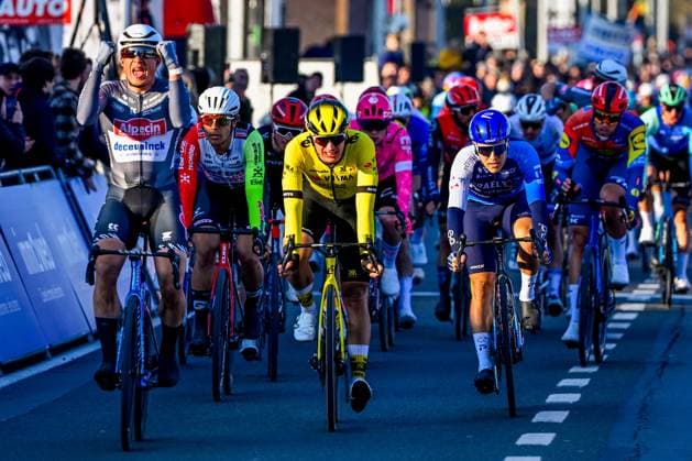 Belgian Jasper Philipsen of Alpecin-Deceuninck celebrates as he crosses the finish line to win the Kuurne-Brussels-Kuurne one day cycling race, 196,9 km from Kuurne to Kuurne via Brussels, Sunday 02 March 2025. ERICxLALMAND  x114022076x
