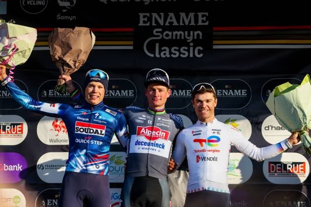 French Paul Magnier of Soudal Quick-Step, Dutch Mathieu van der Poel of Alpecin-Deceuninck and French Emilien Jeanniere of TotalEnergies pictured on the podium after the Ename Samyn Classic one day cycling race, 199,1km from Quaregnon to Dour on Tuesday 04 March 2025. VIRGINIExLEFOUR  x114223745x