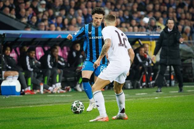Club s Chemsdine Talbi and Aston Villa s Lucas Digne fight for the ball during a soccer game between Belgian Club Brugge KV and English Aston Villa FC, Tuesday 04 March 2025 in Brugge, the first leg of the 1 8 finals of the UEFA Champions League knockout phase. KURTxDESPLENTER  x114227448x