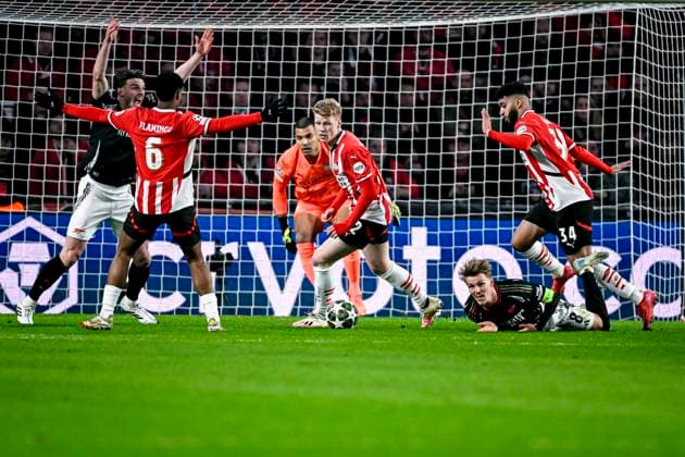PSV midfielder Jerdy Schouten, Arsenal midfielder Martin Odegaard, PSV midfielder Ismael Saibari, during the match PSV - Arsenal at the Philips stadium for the UEFA Champions League- Round of 16 - 1st leg season 2024-2025 in EINDHOVEN, Netherlands on 4 march 2025, (photo by Stefan Koops EYE4images DeFodi Images)