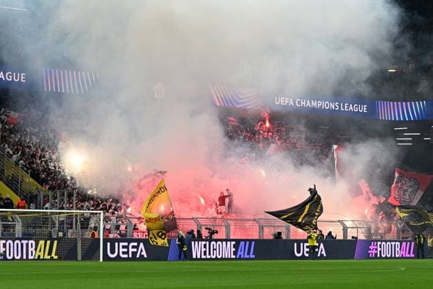 Fans Lille supporters use pyrotechnics during the UEFA Champions League 2024 25 Round of 16 First Leg match between Borussia Dortmund and LOSC Lille at Signal Iduna Park on March 4, 2025 in Dortmund, Germany. (Photo by Ralf Treese DeFodi Images)