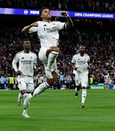 Rodrygo of Real Madrid celebrates scoring the opening goal Real Madrid v Atletico Madrid , UEFA Champions League, Round of 16, First Leg, Football, Santiago Bernabeu, Madrid, Spain - 04 Mar 2025 EDITORIAL USE ONLY No use with unauthorised audio, video, data, fixture lists, club league logos or live services. Online in-match use limited to 120 images, no video emulation. No use in betting, games or single club league player publications. Copyright: xRubenxAlbarran Shutterstockx 15178301ai