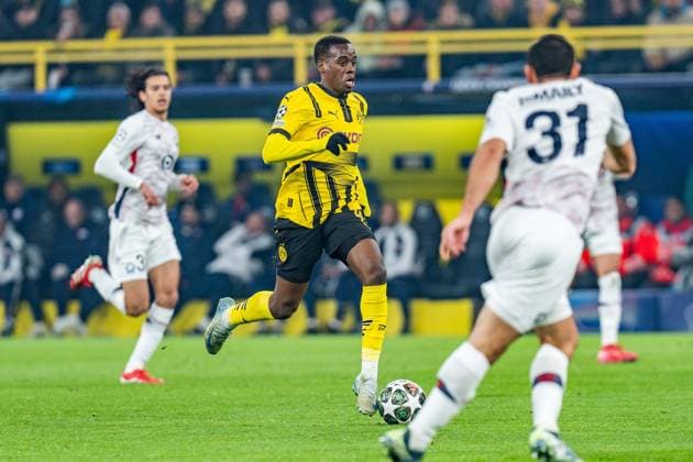 04.03.2025, Borussia Dortmund vs. OSC Lille, UEFA Champions League, Achtelfinale-Hinspiel Jamie Gittens (Borussia Dortmund, 43) Ismaily (OSC Lille, 31) Copyright: xBahhoxKarax