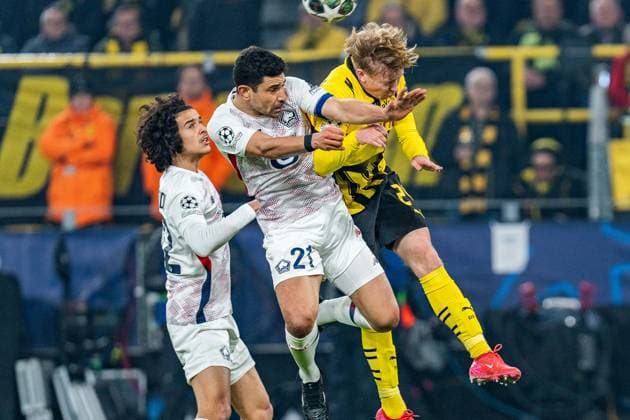 04.03.2025, Borussia Dortmund vs. OSC Lille, UEFA Champions League, Achtelfinale-Hinspiel Daniel Svensson (Borussia Dortmund, 24) Benjamin Andre (OSC Lille, 21) Copyright: xBahhoxKarax